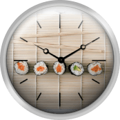 Sushi And Chopsticks On A Wooden Mat